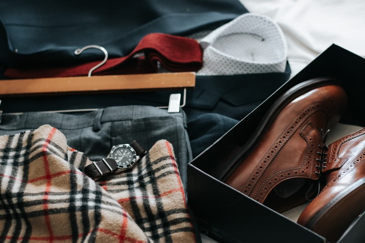Luxury menswear flatlay — premium dry cleaning at Rockville Valet Cleaners